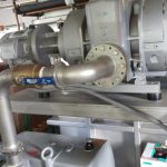 Helium leak testing vacuum pumps